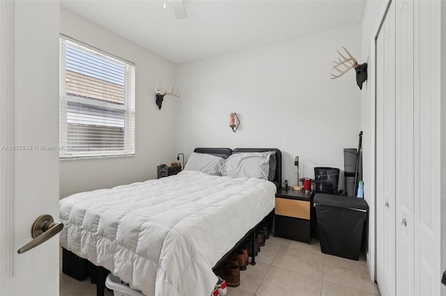14842 SW 22nd Ter, Miami, FL 33185 - bedroom with light tile patterned floors, a closet, and ceiling fan