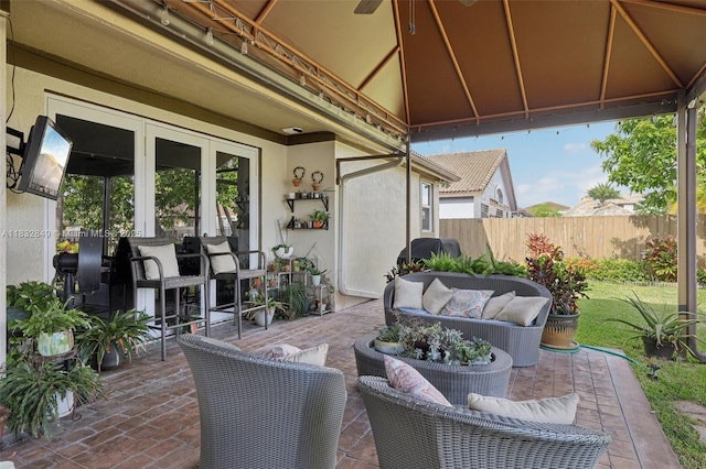 14842 SW 22nd Ter, Miami, FL 33185 - view of patio / terrace featuring an outdoor hangout area and french doors