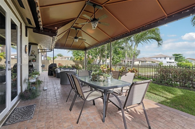 14842 SW 22nd Ter, Miami, FL 33185 - view of patio / terrace with a gazebo, outdoor dining space, and a ceiling fan
