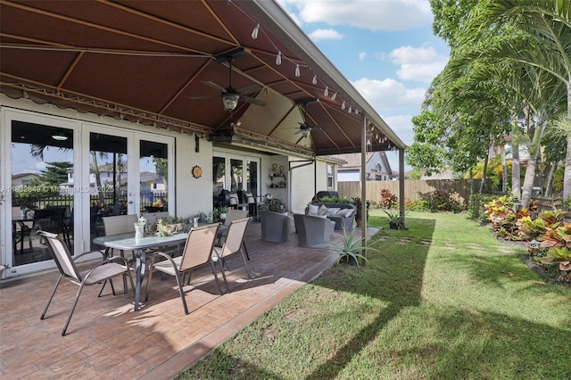 14842 SW 22nd Ter, Miami, FL 33185 - view of patio / terrace featuring french doors, a ceiling fan, and an outdoor living space