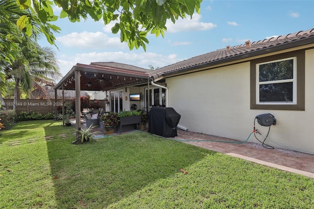 14842 SW 22nd Ter, Miami, FL 33185 - view of yard with a ceiling fan and a patio