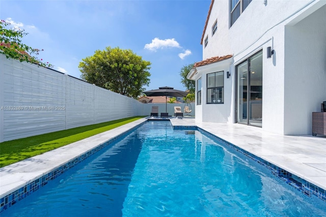 1005 NW 100th Ave, Miami, FL 33172 - view of swimming pool with a fenced backyard and a patio area