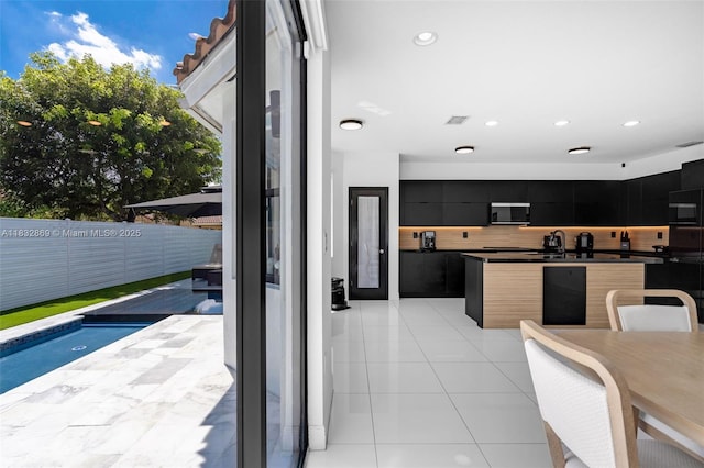 1005 NW 100th Ave, Miami, FL 33172 - dining area featuring recessed lighting and light tile patterned floors