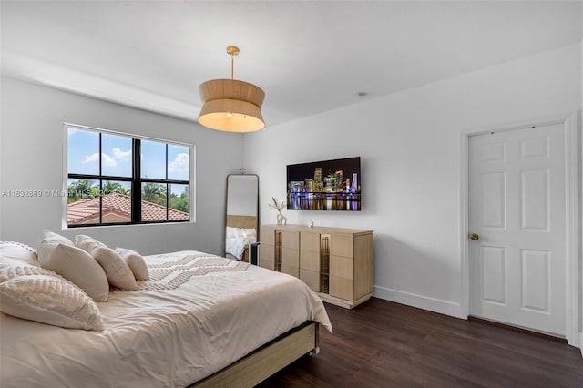 1005 NW 100th Ave, Miami, FL 33172 - bedroom with dark wood-style flooring and baseboards