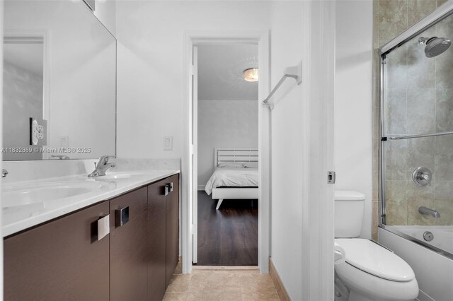 1005 NW 100th Ave, Miami, FL 33172 - ensuite bathroom featuring double vanity and bath / shower combo with glass door