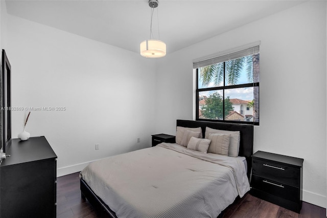 1005 NW 100th Ave, Miami, FL 33172 - bedroom with baseboards and dark wood finished floors