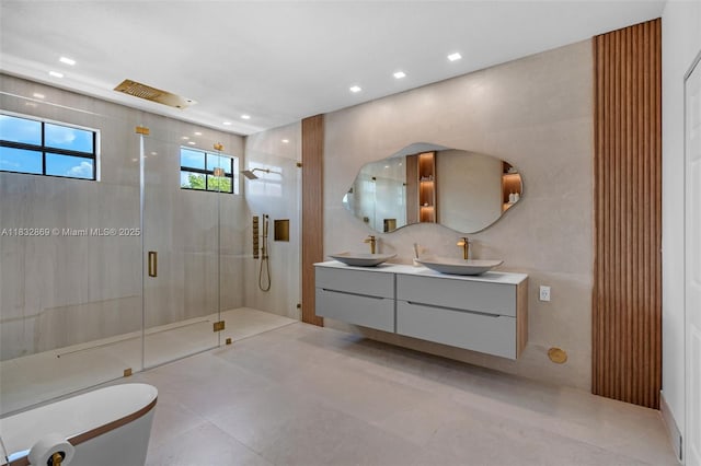 1005 NW 100th Ave, Miami, FL 33172 - full bath featuring double vanity, a stall shower, recessed lighting, tile patterned flooring, and tile walls