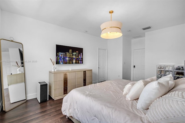 1005 NW 100th Ave, Miami, FL 33172 - bedroom featuring dark wood finished floors and baseboards