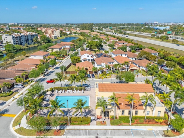 1005 NW 100th Ave, Miami, FL 33172 - aerial view of residential area featuring a large body of water and a pool area