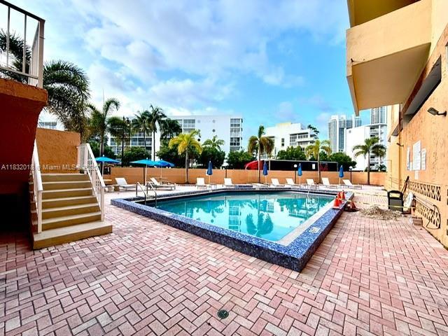 200 178th Dr Unit 409, Sunny Isles Beach, FL 33160 - community pool with a patio