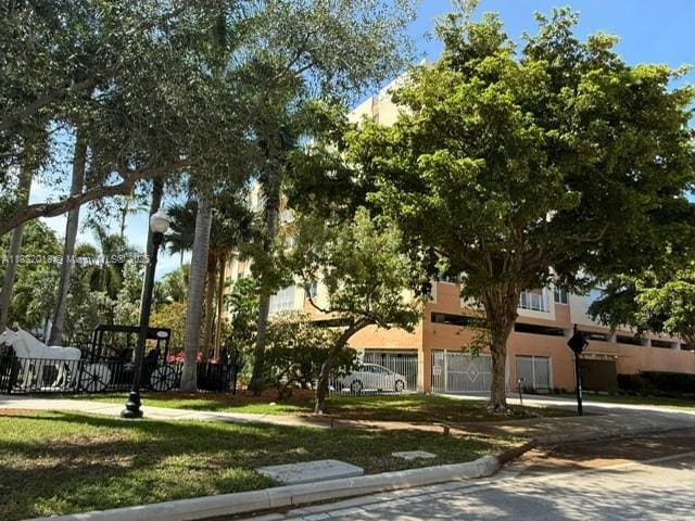 200 178th Dr Unit 409, Sunny Isles Beach, FL 33160 - view of front facade featuring stucco siding