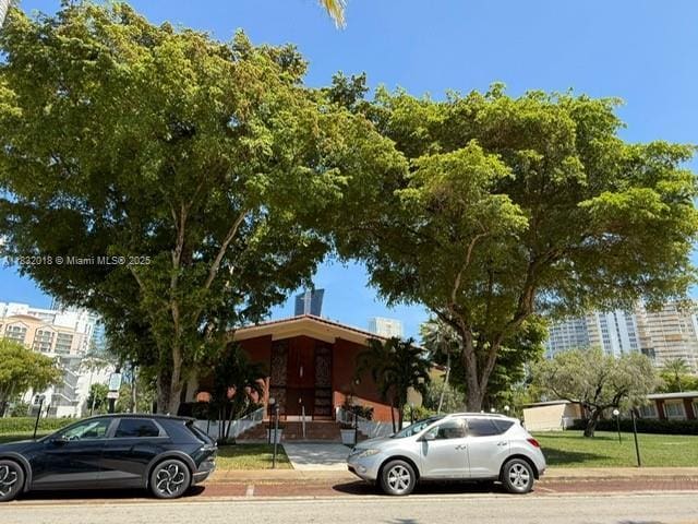 200 178th Dr Unit 409, Sunny Isles Beach, FL 33160 - view of front facade featuring a chimney
