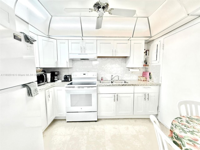200 178th Dr Unit 409, Sunny Isles Beach, FL 33160 - kitchen with white appliances, under cabinet range hood, backsplash, and a ceiling fan