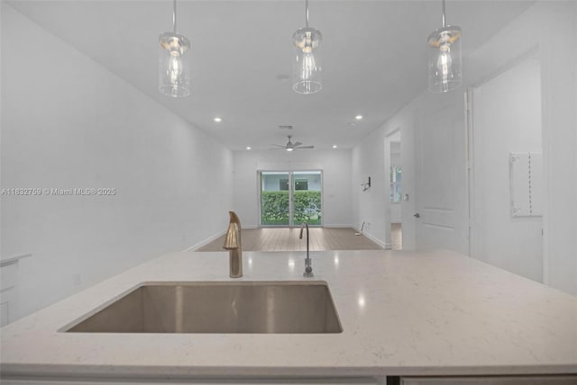 14549 Bretton Woods Trce, Delray Beach, FL 33446 - kitchen featuring open floor plan, hanging light fixtures, light stone countertops, and recessed lighting
