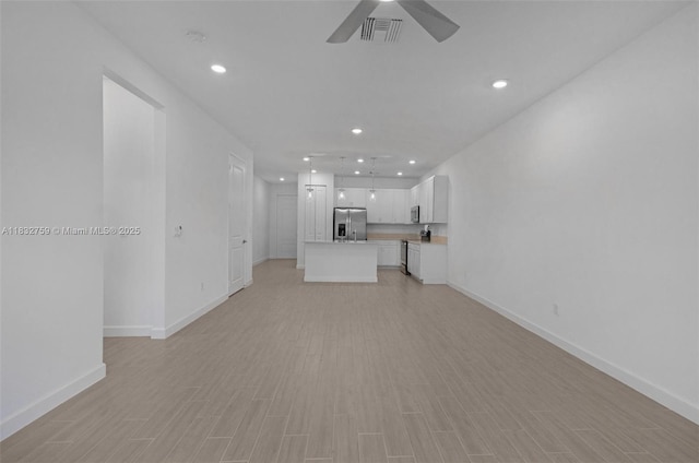 14549 Bretton Woods Trce, Delray Beach, FL 33446 - unfurnished living room with a ceiling fan, recessed lighting, and light wood-style floors