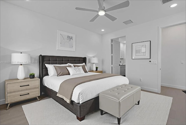 14549 Bretton Woods Trce, Delray Beach, FL 33446 - bedroom with wood finished floors, recessed lighting, ensuite bath, and a ceiling fan