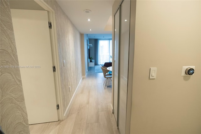45 SW 9th St Unit 1705, Miami, FL 33130 - hallway featuring light wood finished floors and recessed lighting