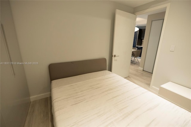 45 SW 9th St Unit 1705, Miami, FL 33130 - bedroom featuring light wood-style floors