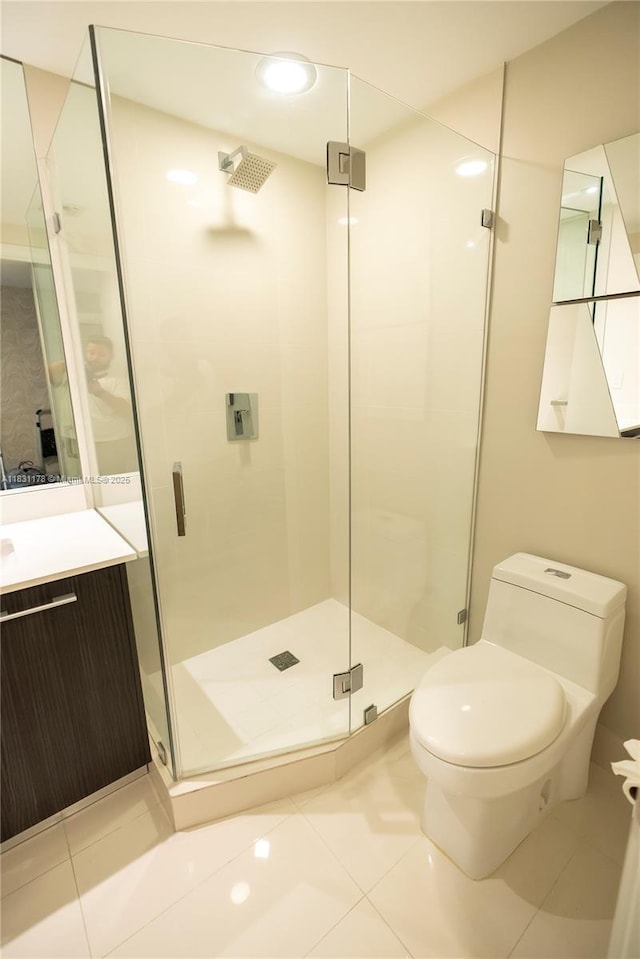 45 SW 9th St Unit 1705, Miami, FL 33130 - bathroom featuring tile patterned floors, a stall shower, and vanity