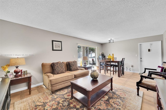 470 N Laurel Dr Unit 3A, Margate, FL 33063 - living area featuring a textured ceiling