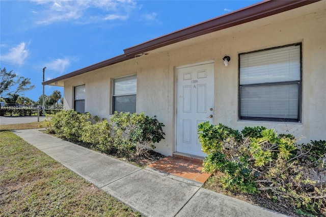 1200 W 31st St, Riviera Beach, FL 33404 - view of exterior entry with stucco siding