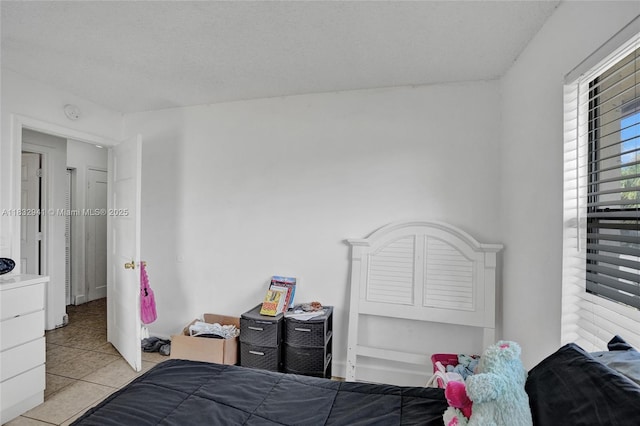 1200 W 31st St, Riviera Beach, FL 33404 - bedroom with tile patterned floors