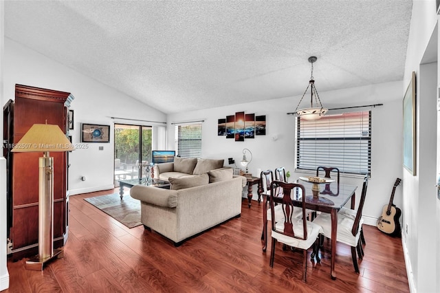 631 SW 113th Ave, Pembroke Pines, FL 33025 - living area featuring a textured ceiling, dark wood-style floors, and vaulted ceiling