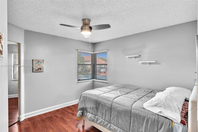 631 SW 113th Ave, Pembroke Pines, FL 33025 - bedroom featuring wood finished floors, a textured ceiling, and ceiling fan