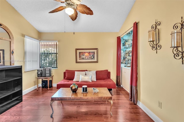 631 SW 113th Ave, Pembroke Pines, FL 33025 - living area with vaulted ceiling, ceiling fan, wood finished floors, and a textured ceiling