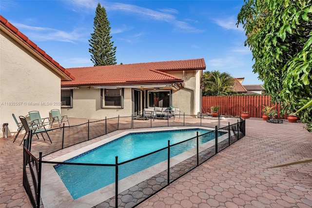 631 SW 113th Ave, Pembroke Pines, FL 33025 - view of pool with an outdoor hangout area and a patio area