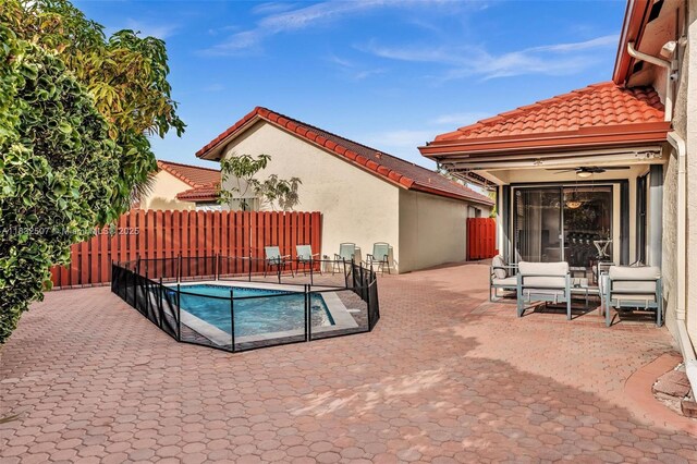 631 SW 113th Ave, Pembroke Pines, FL 33025 - view of swimming pool with a patio and ceiling fan