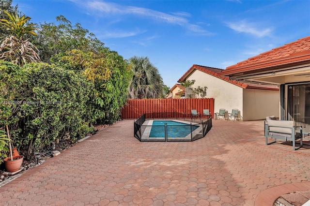 631 SW 113th Ave, Pembroke Pines, FL 33025 - view of pool with a patio area and a fenced backyard
