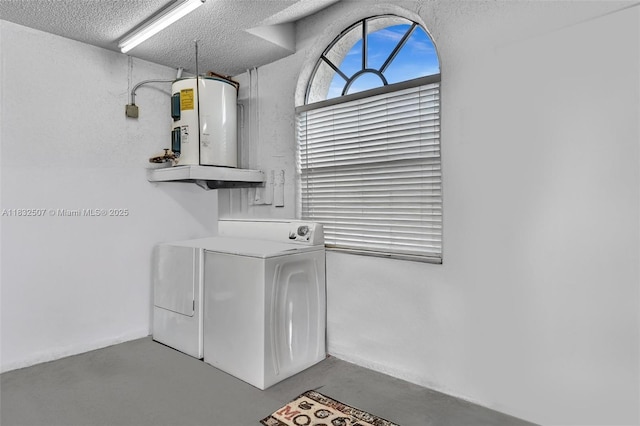 631 SW 113th Ave, Pembroke Pines, FL 33025 - laundry area with washer and clothes dryer, electric water heater, and a textured ceiling