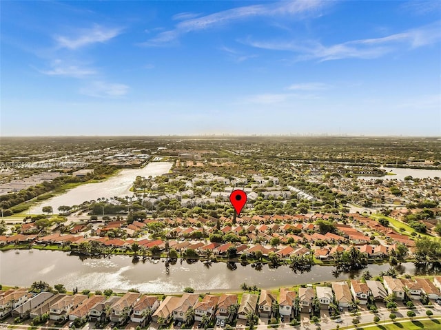 631 SW 113th Ave, Pembroke Pines, FL 33025 - aerial view of property's location with nearby suburban area and a large body of water
