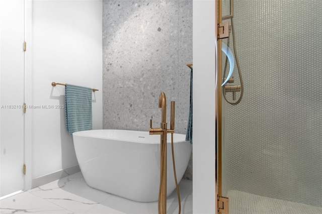 2655 S Bayshore Dr Unit 2012, Miami, FL 33133 - full bath with marble finish floors, a freestanding tub, and a shower