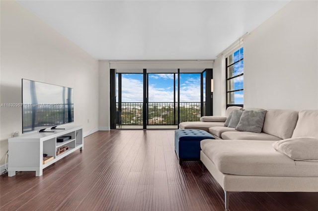 2500 NE 135th St Unit C711, North Miami, FL 33181 - living room with wood finished floors and expansive windows