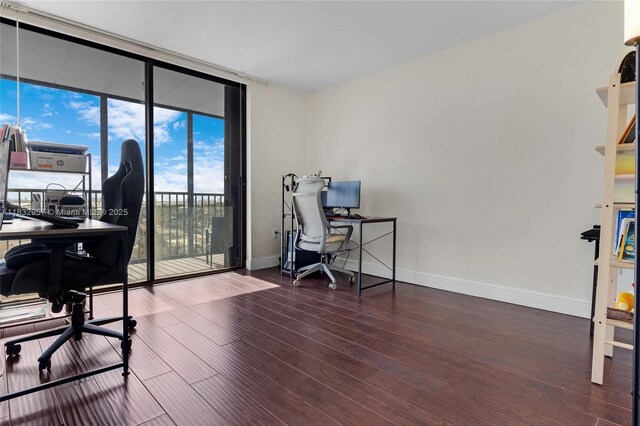 2500 NE 135th St Unit C711, North Miami, FL 33181 - home office with wood finished floors and a wall of windows