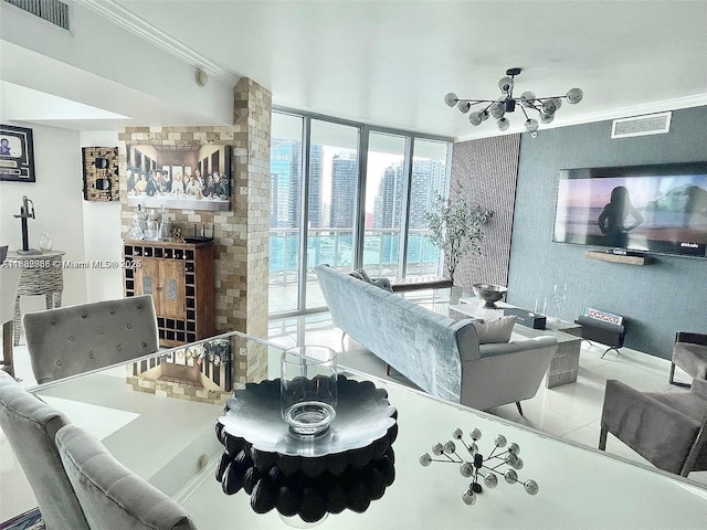 350 S Miami Ave Unit 3602, Miami, FL 33130 - dining space featuring a chandelier, crown molding, and tile patterned flooring