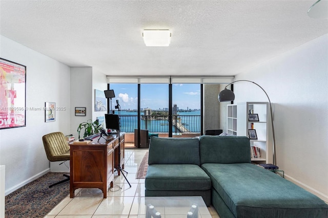 555 NE 15th St Unit 15B, Miami, FL 33132 - living room featuring light tile patterned floors and a textured ceiling