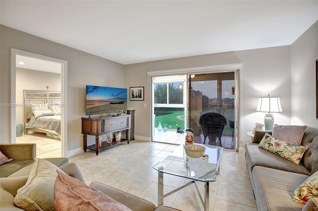 800 SW 125th Way Unit 405O, Pembroke Pines, FL 33027 - living room with light tile patterned floors and baseboards