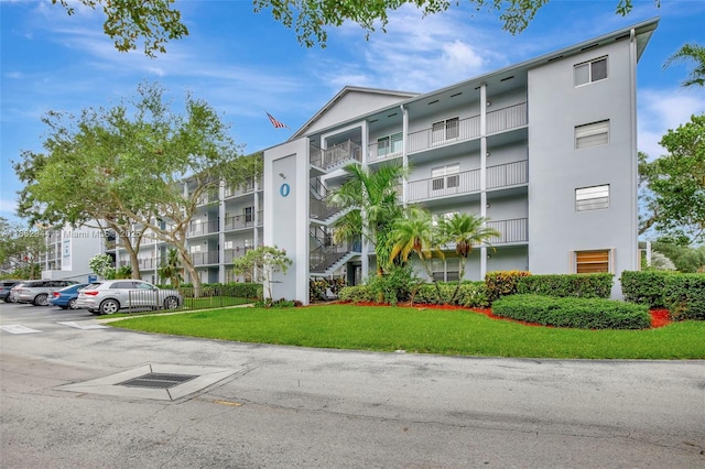800 SW 125th Way Unit 405O, Pembroke Pines, FL 33027 - view of apartment building / complex featuring uncovered parking
