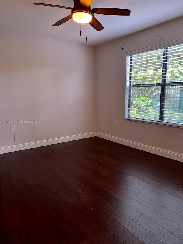 15661 SW 104th Ter Unit 3112, Miami, FL 33196 - spare room featuring dark wood-style flooring and a ceiling fan