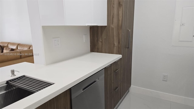 230 SW 117th Ter, Pembroke Pines, FL 33025 - kitchen with modern cabinets, electric panel, stainless steel dishwasher, and light countertops