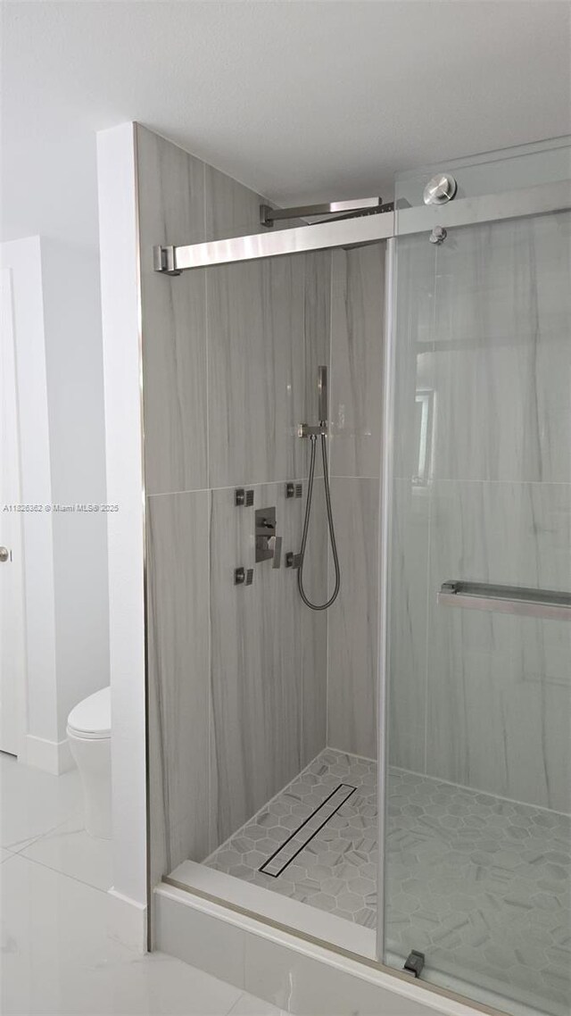 230 SW 117th Ter, Pembroke Pines, FL 33025 - full bathroom featuring a marble finish shower and tile patterned floors