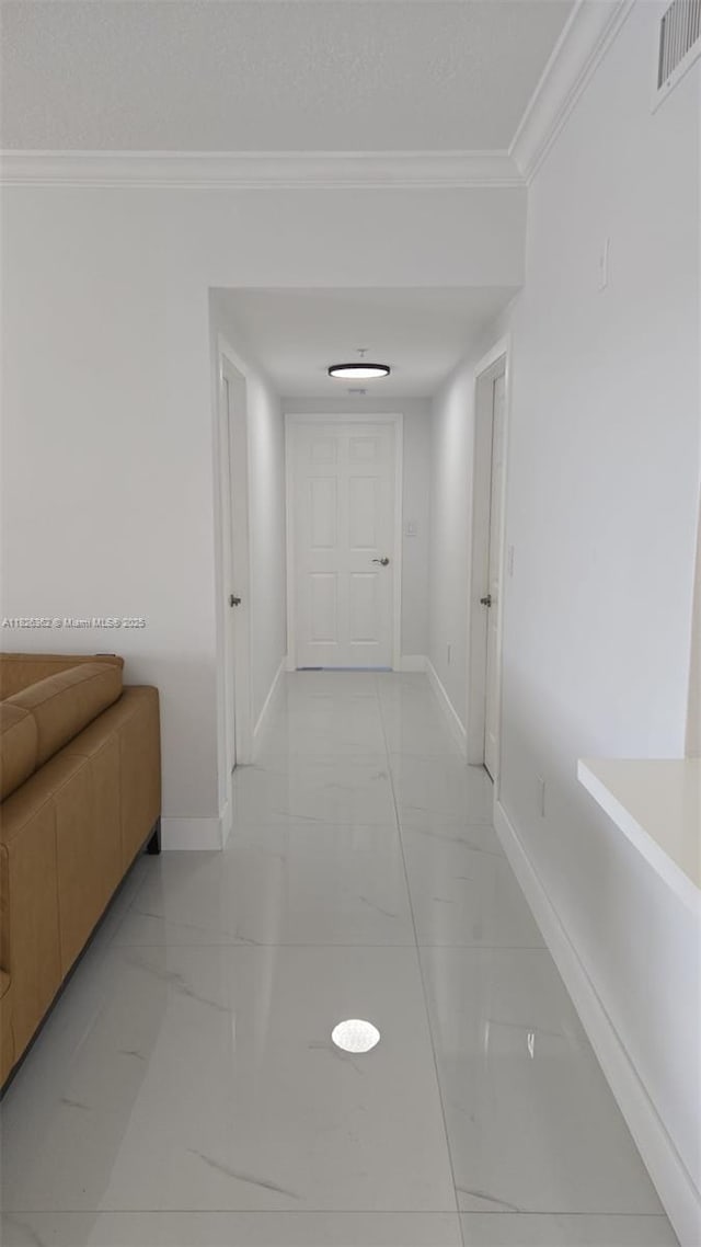 230 SW 117th Ter, Pembroke Pines, FL 33025 - corridor featuring light marble finish floors and ornamental molding