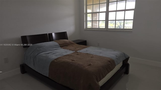 230 SW 117th Ter, Pembroke Pines, FL 33025 - bedroom featuring baseboards