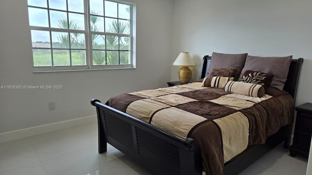 230 SW 117th Ter, Pembroke Pines, FL 33025 - bedroom featuring marble finish flooring and baseboards