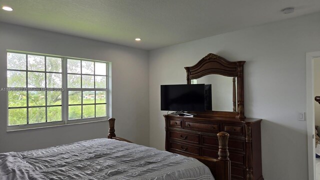 230 SW 117th Ter, Pembroke Pines, FL 33025 - bedroom with multiple windows and recessed lighting