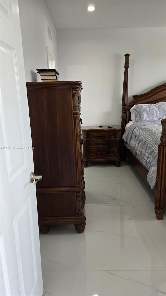 230 SW 117th Ter, Pembroke Pines, FL 33025 - bedroom with light marble finish floors and recessed lighting
