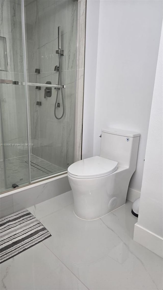 230 SW 117th Ter, Pembroke Pines, FL 33025 - bathroom featuring toilet and a shower stall